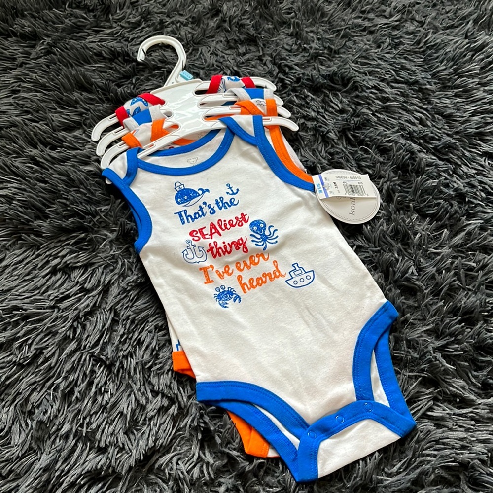 4 pack of sleeveless onesies